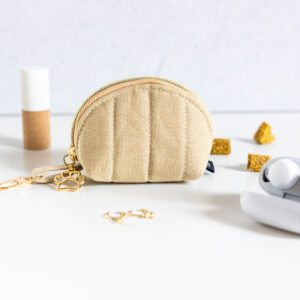 Produktfoto eines vielfältigen Täschchens in der Farbe Beige